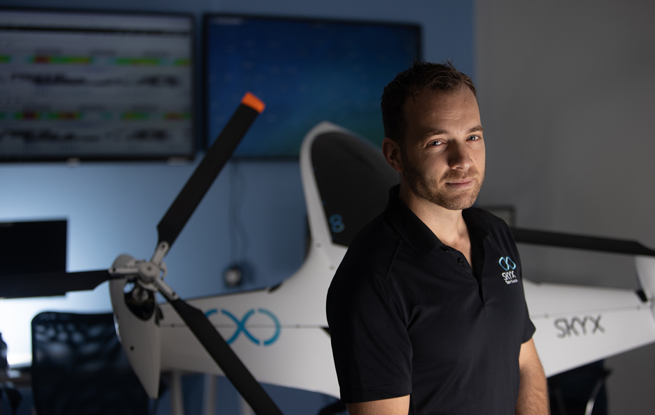 CEO Didi Horn with a SkyX drone