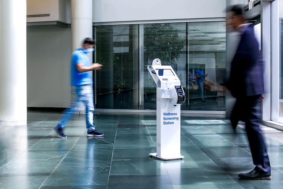 The Wellness Screening Station in a busy lobby of an office building